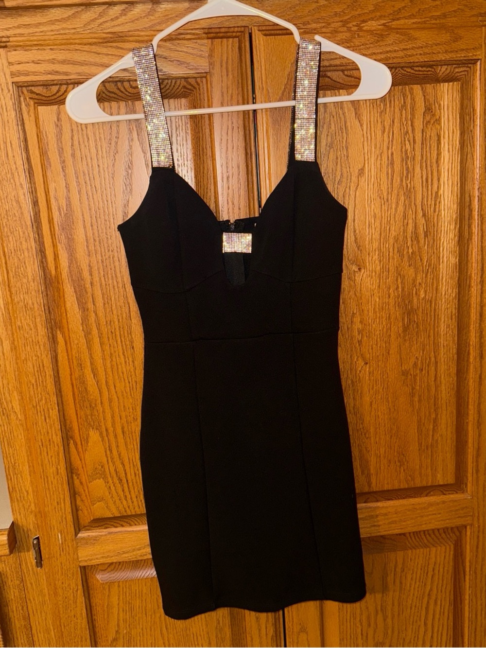 black mini dress with rhinestone details